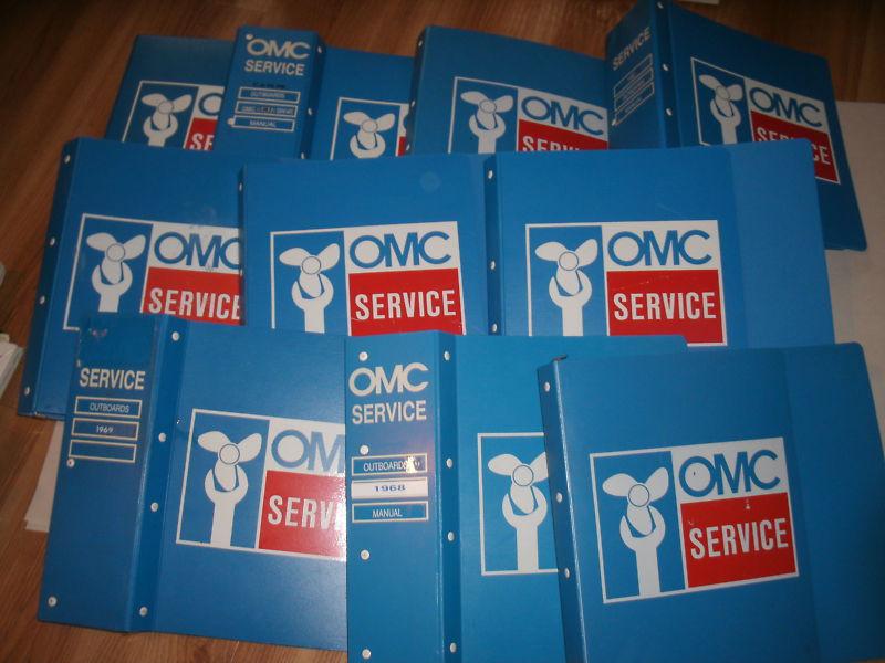Lot of 10 empty omc outboard service manual binders