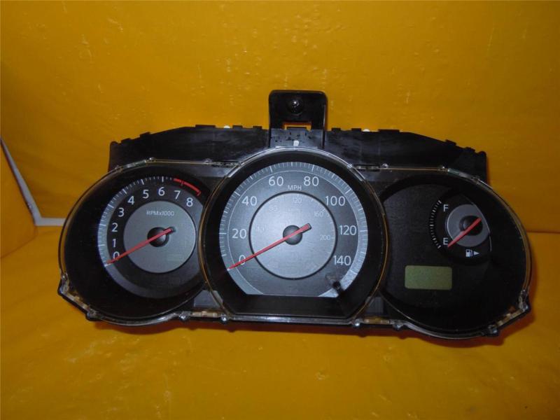 09 versa speedometer instrument cluster dash panel gauges 82,345