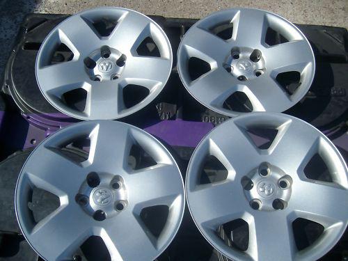 Four 17" dodge charger  08-10 hub caps/ wheel covers