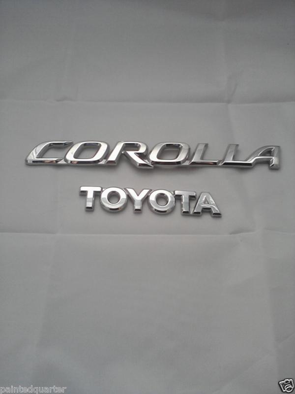 2006 toyota corolla  emblem logo  nameplate rear trunk genuine oem 