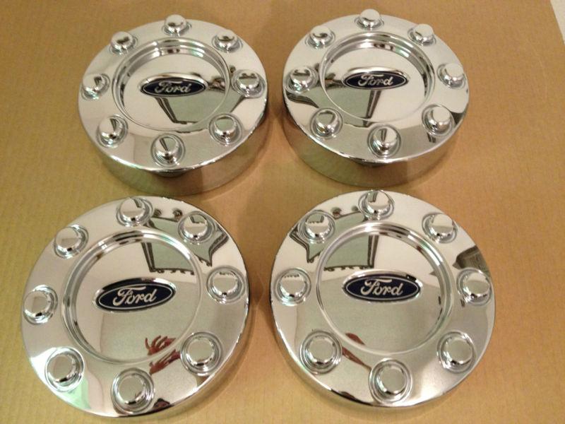 2011 ford f250 xlt chrome center caps  (4) **great condition**