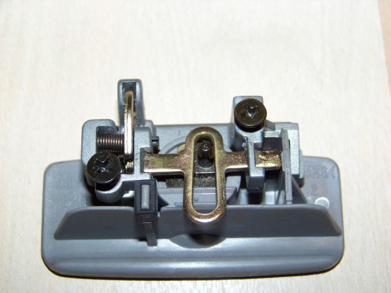 2002-2005 kia sedona lower glove box handle