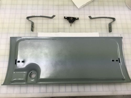 1957 cadillac dash glove box door with arms and latch