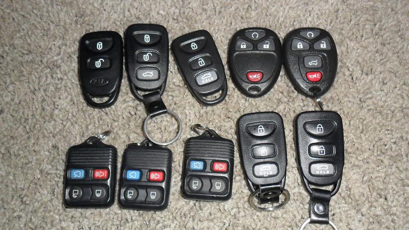 Lot of 10 used keyless remotes transmitter key fobs kia hyundai gm ford