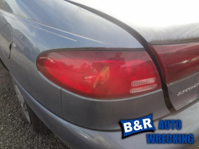Left taillight for 98 99 00 01 02 escort ~ sdn   back-up lamp in lens 4800476