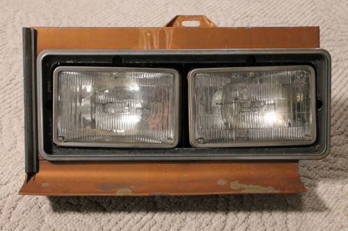 1975-76 cadillac eldorado driver headlight assembly