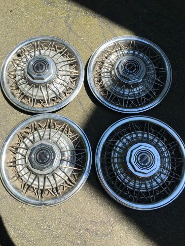 Vintage spoked hub caps
