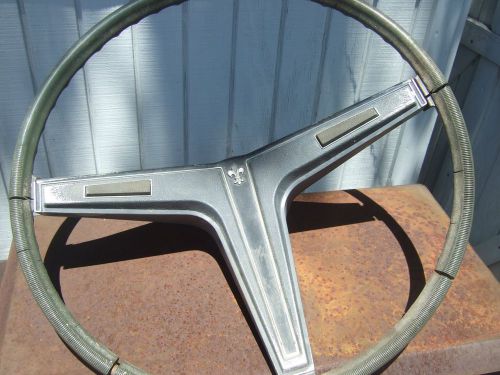 1968  cheverolet green deluxe steering wheel/ shroud