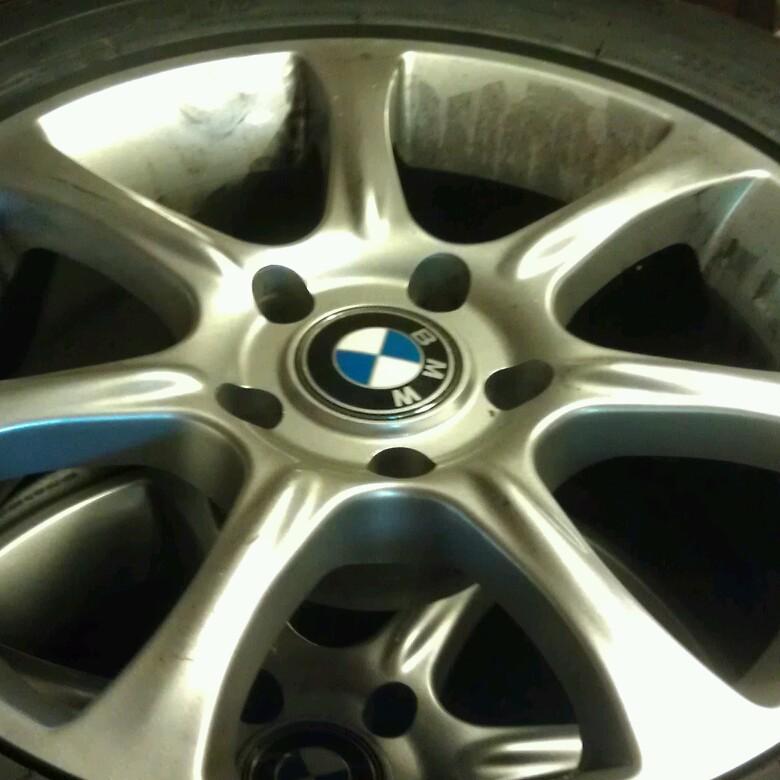 4 bmw oem wheels with unmatched set of snow tires plus one spare - just reduced