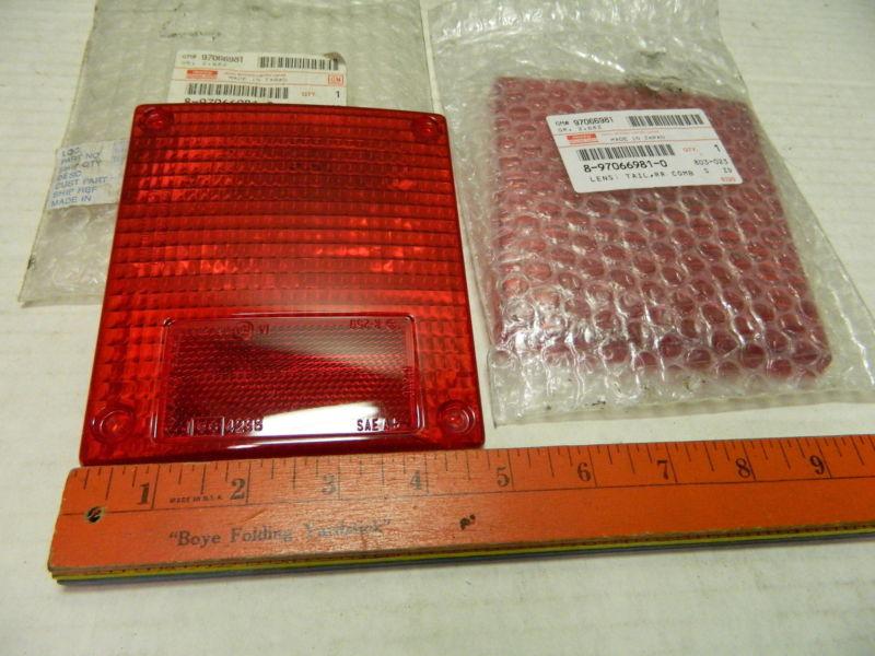 Pair isuzu lens red unknown car or truck model: tail, rr comb gm# 97066981
