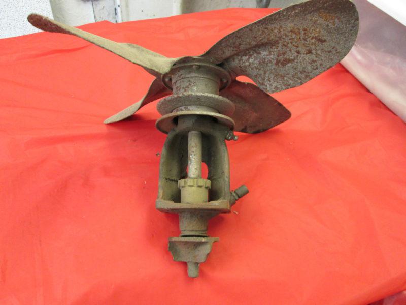 Model a ford used water pump with a good 4 blade fan