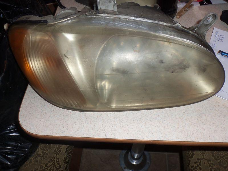 2000 kia sephia ls right passenger headlight