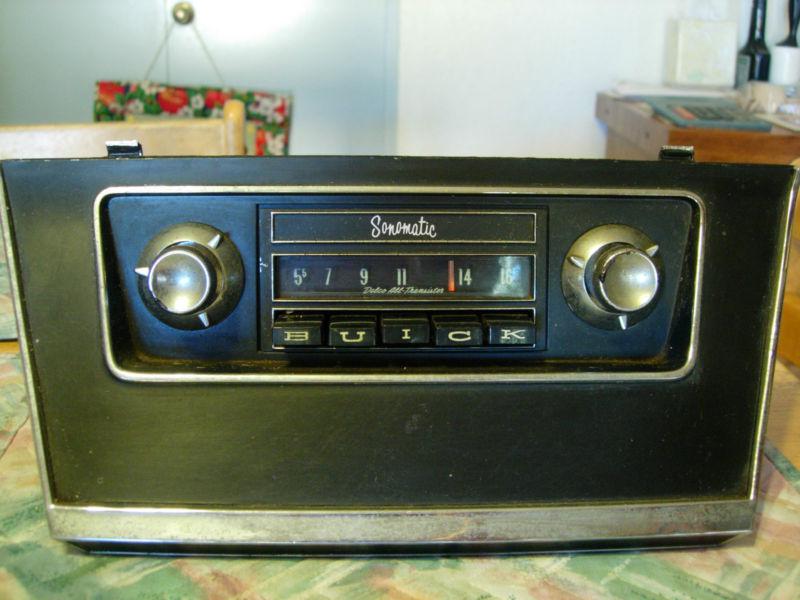 Buick 1964 am radio #980655a with  mounting bezel