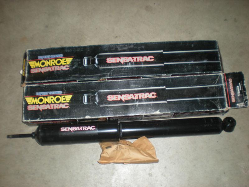 New pair of monroe expert series 5897 st rear shock absorbers shocks