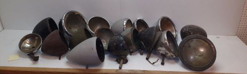 Lot of 18 vintage used headlight buckets varying from ford, gm, and mopar.