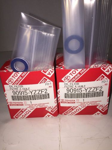 Pair of toyota genuine parts 90915-yzzf2 oil filters with drain plug washers