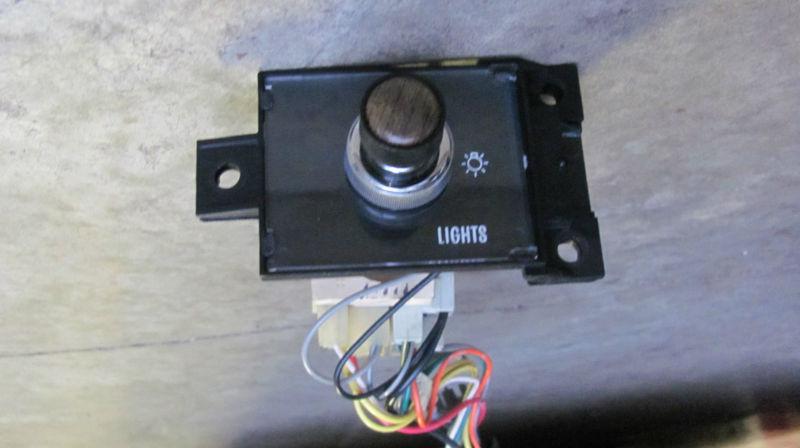 1986-1992 cadillac brougham fleetwood headlight switch and panel, oem excellent