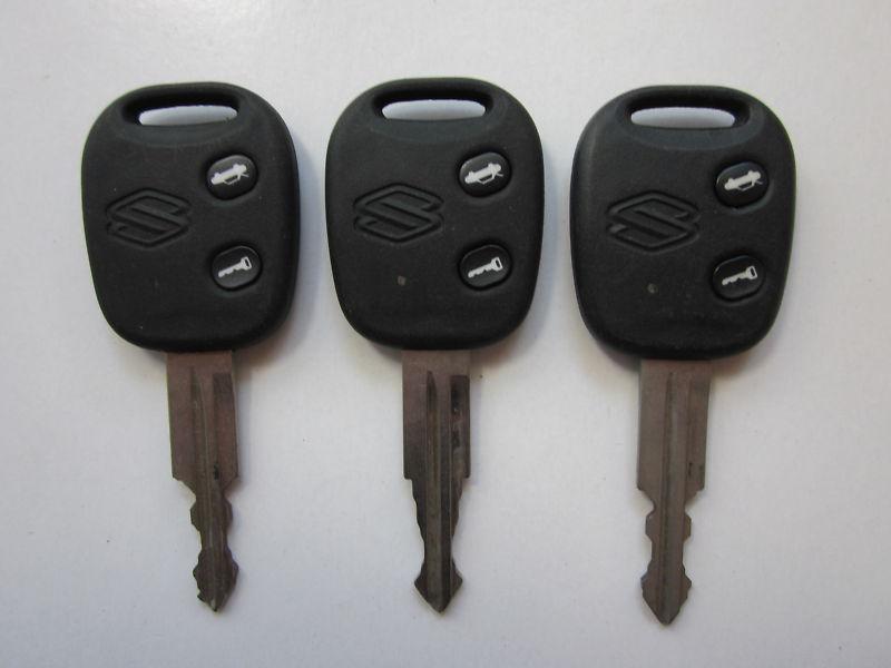 Lot of 3 oem suzuki key keyless remote kr55wy8201-2-3