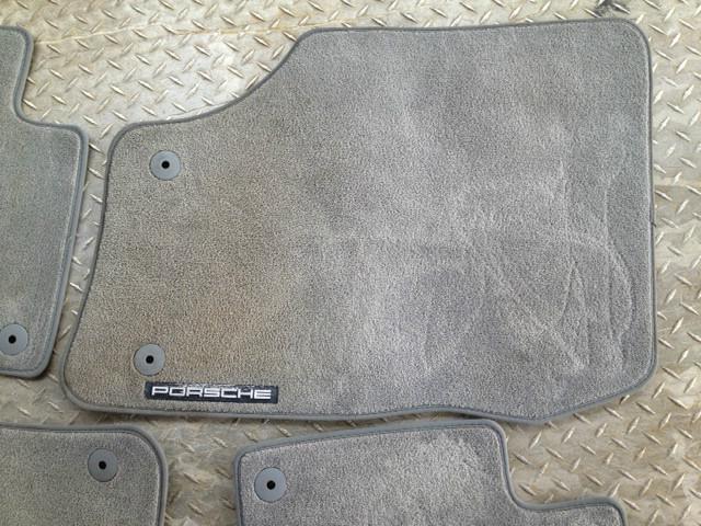 2006-2010 porsche cayenne oem used 4 piece carpet / mat set