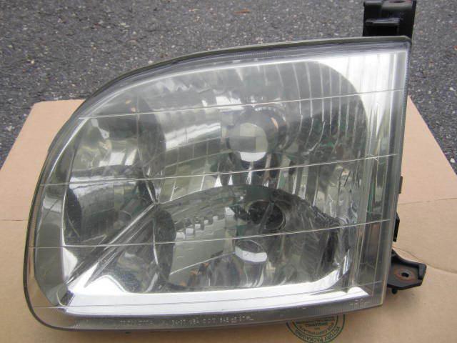 Oem 2004 toyota tundra access cab front lh headlight lens assembly - used