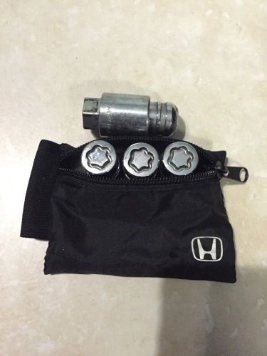 Honda wheel lock set fits accord, civic, and more! genuine honda accessory!