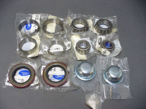 49 50 51 52 53 ford front wheel bearing set races seals grease caps
