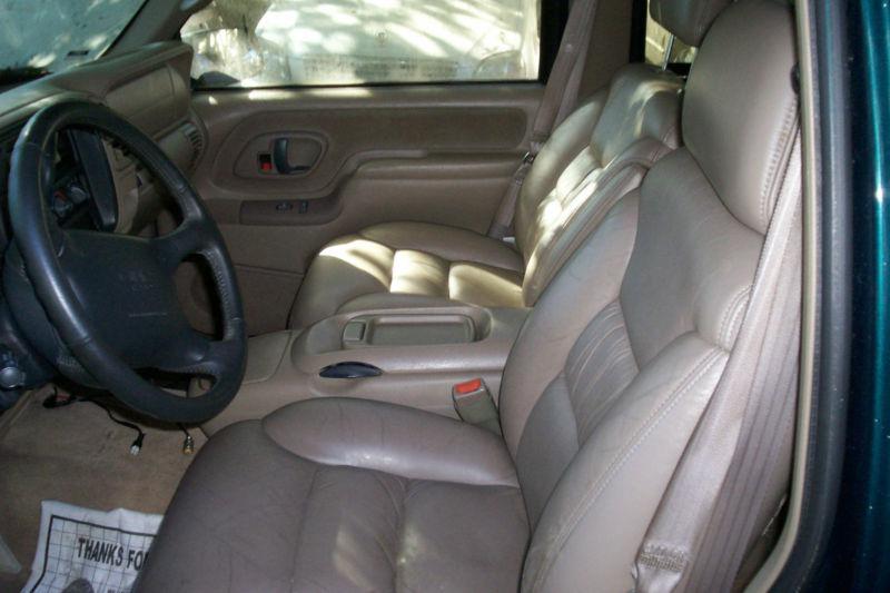 1997 gms suburban leather seats. tan  no reserve!!