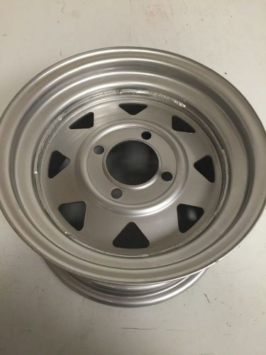 Polaris 8 spoke silver wheel 12x7 4/4 bolt pattern