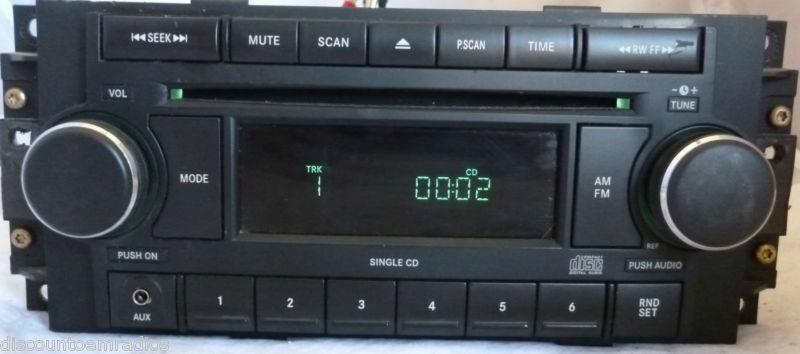 04-10 chrysler dodge jeep radio cd aux port ref p05064171ah