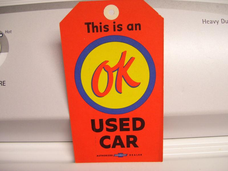 Vintage nos gm chevy ok used cars visor steering wheel dealer tag original sign