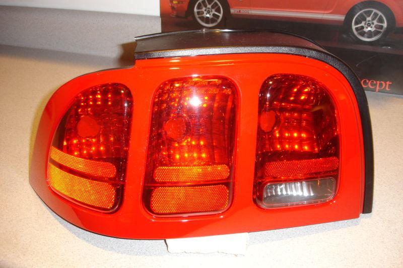 96 97 98 ford mustang driver left rear taillight assembly #2 nos rio red