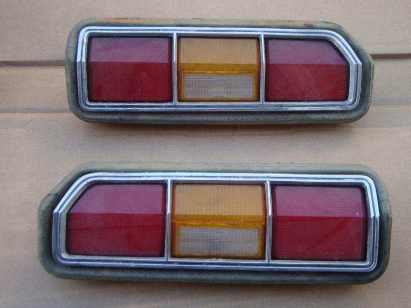 74-75-75-76-77-78 ford mustang  left and right  tail light w/ bezel