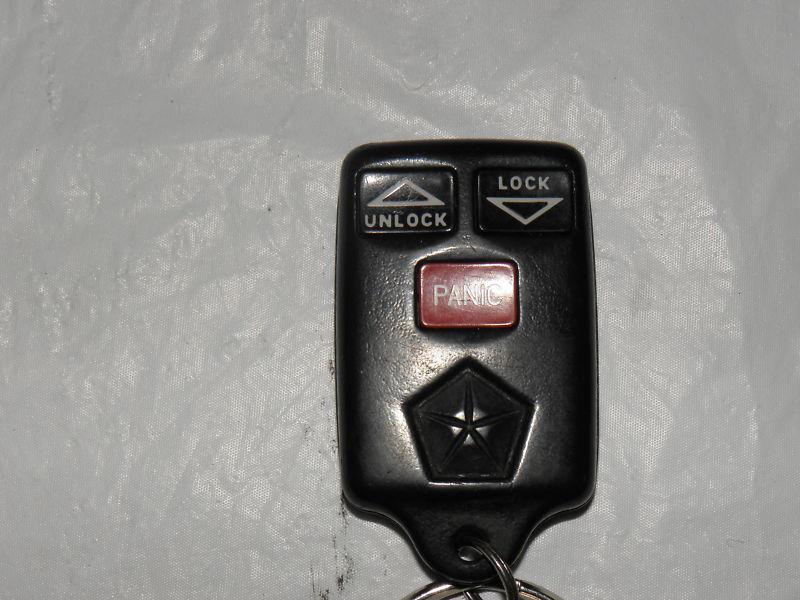 Chrysler dodge grand caravan oem keyless remote lock transmitter fob gq43vt7t 