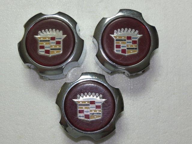 Cadillac wheel center caps,  hubcap center caps