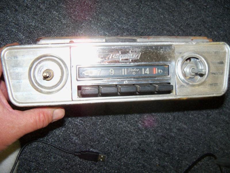 Working original 1963 chevy corvair am radio gm delco serviced with bezel 985449