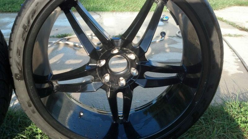 26" black status rims with tires (used)