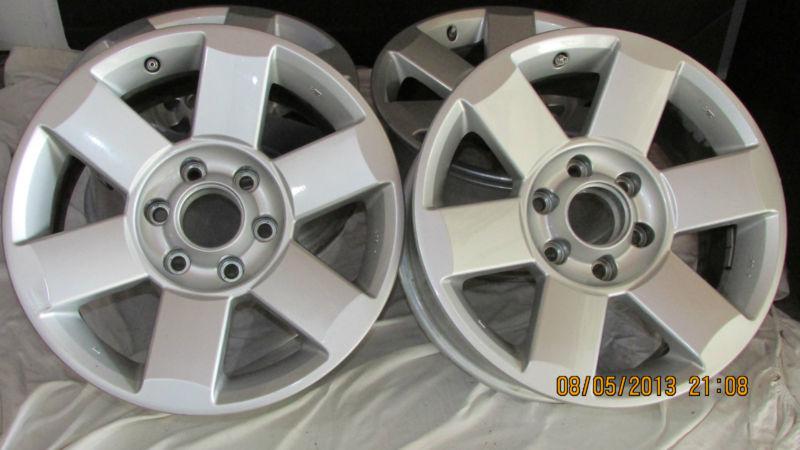 Nissan armada & titan rims size 18 a set of four in great shape with air sensors