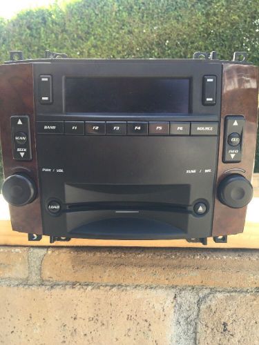 Cadillac factory (oem) radio and 6 cd player 15824242 cts