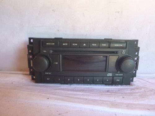 04-10 chrysler dodge jeep radio cd face plate p05091710af pb6834