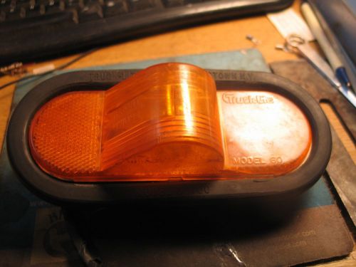 Truck lite model 60 60700  stop/turn/tail and front park oval orange