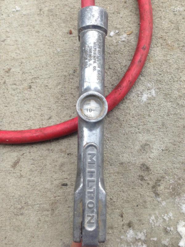 Milton inflator gage tire pressure gage long hose psi readout 100 psi