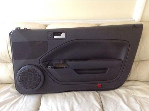 Ford mustang right side door panel for 2005-2008 modles. black color 