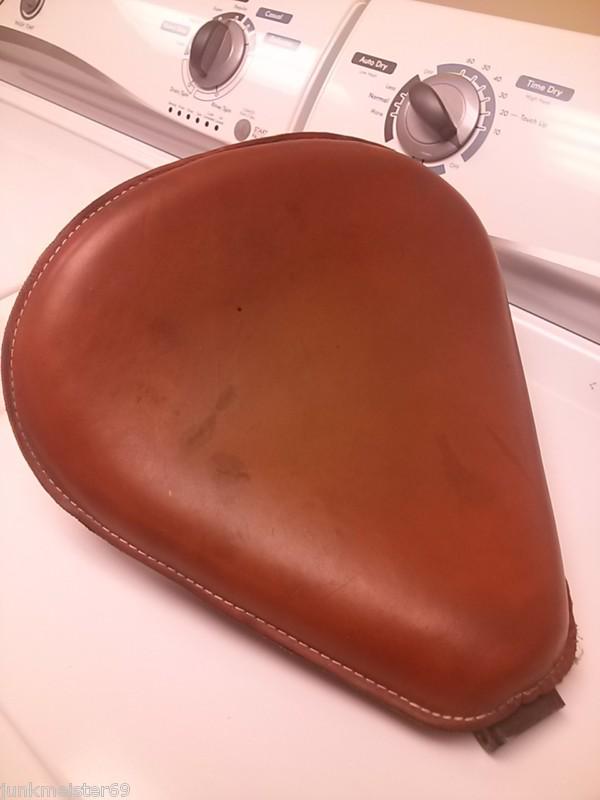 Brown leather solo seat with springs