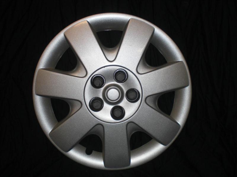 2005 ford taurus hub cap / wheel cover (7 spoke, smooth spokes)