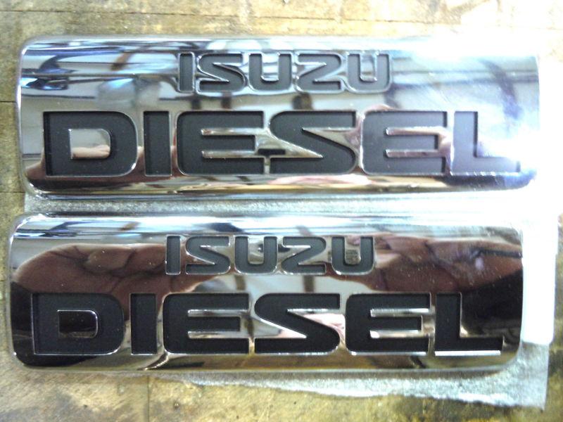 Isuzu diesel emblems - new!  sold set of 2