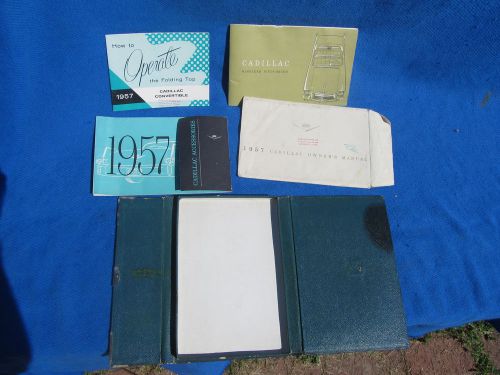 1957 cadillac original leather box  w/ owners manual ,accessories,folding top