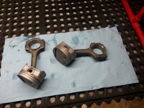 Ford focus zx3                                          (2) oem ford pistons/rod