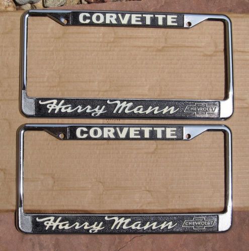 Nos original pair of harry mann corvette dealer plate frames