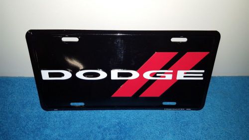 Dodge racing team black metal vanity plate with white letters red