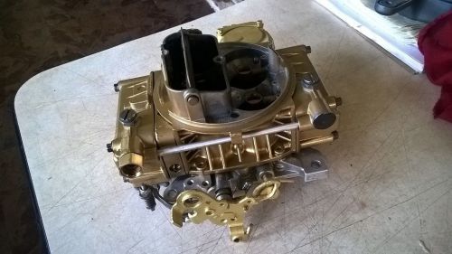 Holley  rebuilt carburetor 4 v  600 cfm #1850 m choke $185 + $50